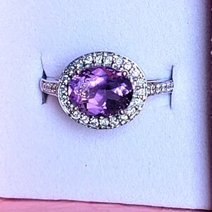 14K WHITE GOLD RING WITH BEAUTIFUL AMETHYST AND NATURAL DIMONDS ALL AROUND.